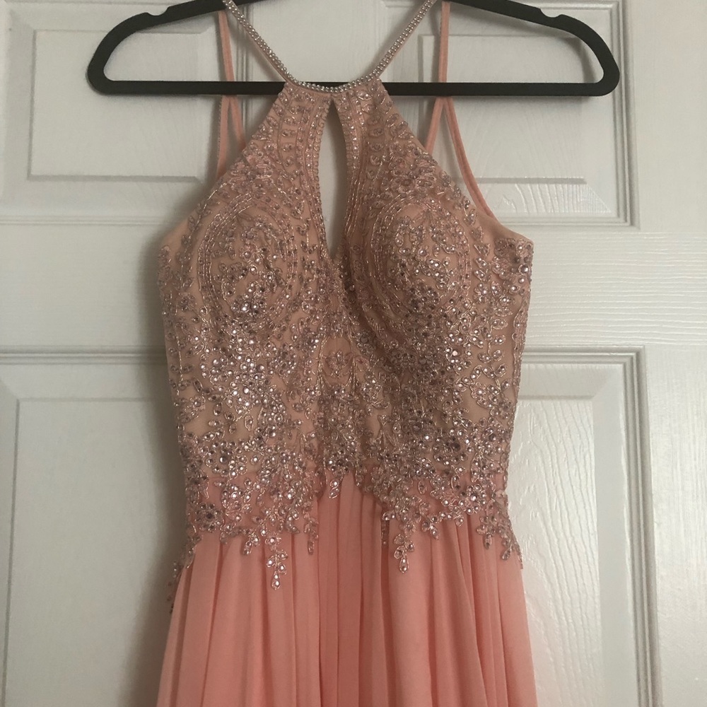 Salmon colored, worn once. Perfect condition.